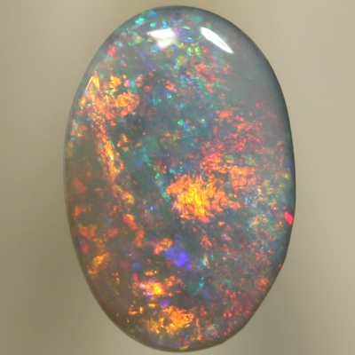 SOLID SEMI BLACK OPAL Sparkles of red/orange over green/blue